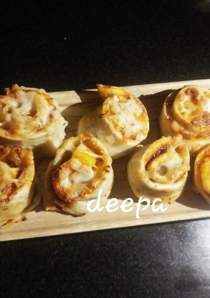 A picture of Herbed pizza roll ups.