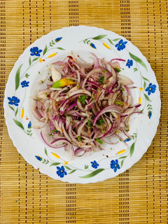 A picture of Lacha onion salad.
