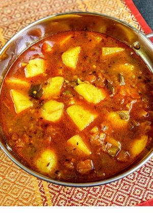 A picture of Potato and tomato curry.
