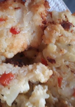Una foto de Tortajitas de papa, arroz y cebolla