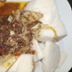 A picture of Yam & vegetables with chicken soup.