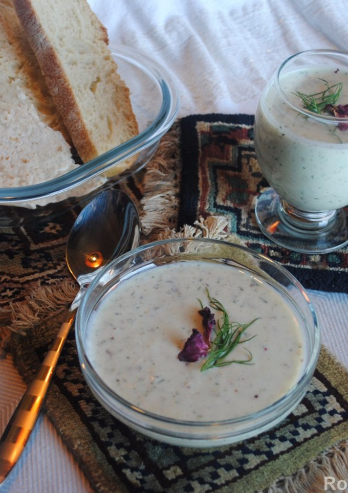 A picture of Cucumber soup with yogurt, raisins and walnut (Aab- dogh khiar).