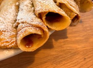 Una foto de Panqueques Clásicos con Dulce de Leche: Listos en 30 Minutos