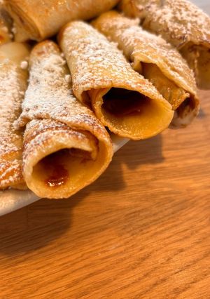 Una foto de Panqueques Clásicos con Dulce de Leche: Listos en 30 Minutos