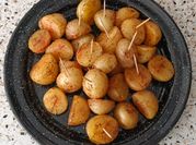 Una foto de papitas con mantequilla