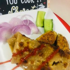 A picture of Chicken Gola kabab roll.