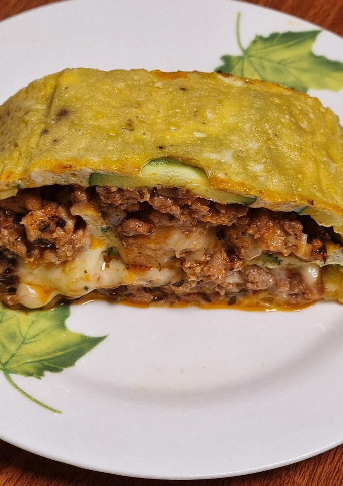 Una foto de Rollo de calabacín y carne picada