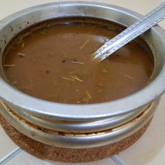 A picture of South Indian pepper rasam.