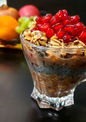 A picture of Overnight Oats with Chocolate Nuts and Pomegranate.