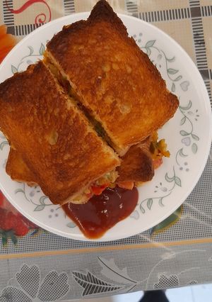 A picture of Pizza hidden in sandwich.