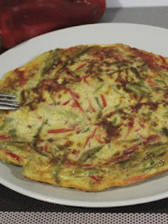 Una foto de Tortilla de dos pimientos