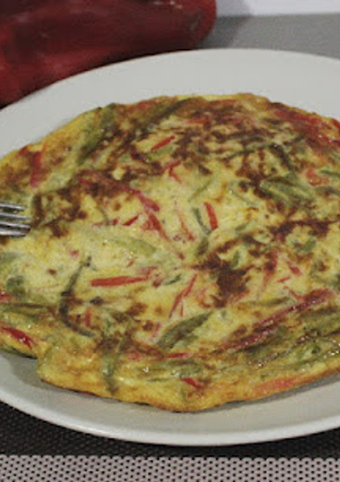 Una foto de Tortilla de dos pimientos