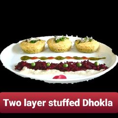 A picture of Beetroot stuffed dhokla.