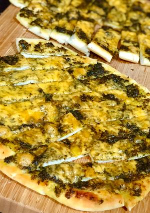A picture of Cheesy-pesto breadstick.