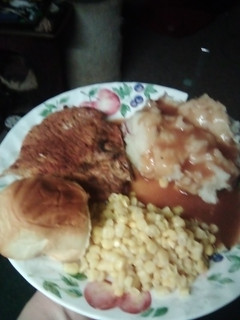A picture of Pork chop dinner.