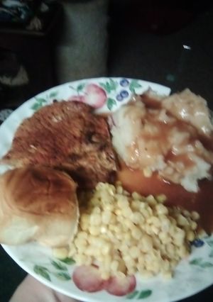 A picture of Pork chop dinner.