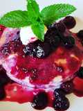 Pink pancake with fresh berries souce