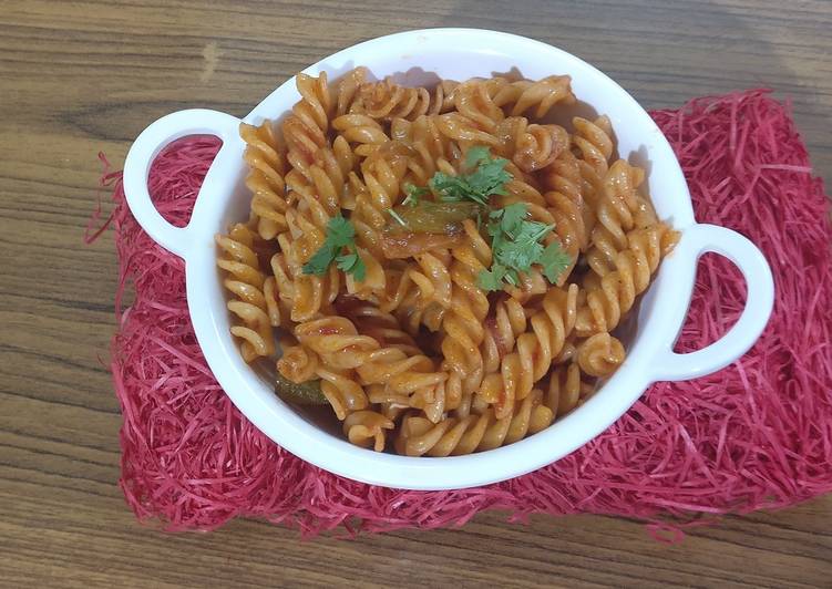 Simple,tangy, spiral pasta