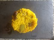 Una foto de paella de alcachofa
