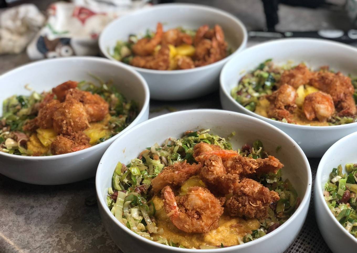 Coconut Shrimp w/ Leek Slaw over Cajun Grits