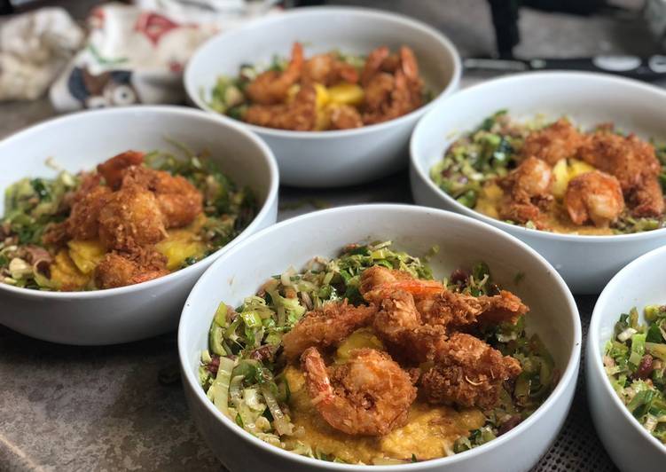 Coconut Shrimp w/ Leek Slaw over Cajun Grits Coconut Shrimp w/ Leek Slaw over Cajun Grits