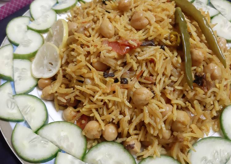 Steps to Prepare Ultimate Spicy chana (chick peas) Pulao😋😋😋