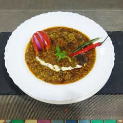 A picture of Green peas nimona with badi.