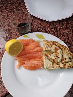 Una foto de Sashimi de Salmón