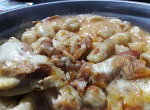 Una foto de Ñoquis de papas gratinados