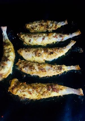 Una foto de Bacaladillas con hierbas & limón en el horno