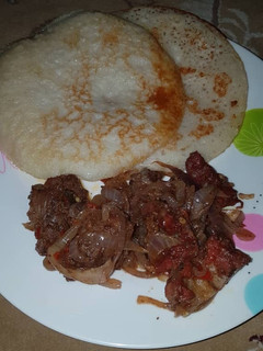 A picture of Rice masa and beef sauce.