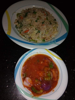 A picture of Fried rice with manchurian.