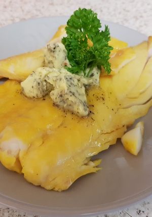A picture of My lovely piece of Poached Smoked Haddock with herb Butter.