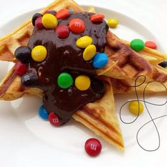 A picture of Cinnamon Waffle With Chocolate and M&M.