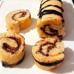 A picture of Nutella And Banana Swiss Roll.