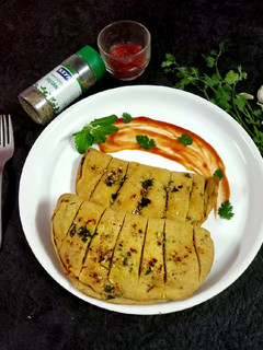 A picture of Home made cheese garlic bread.