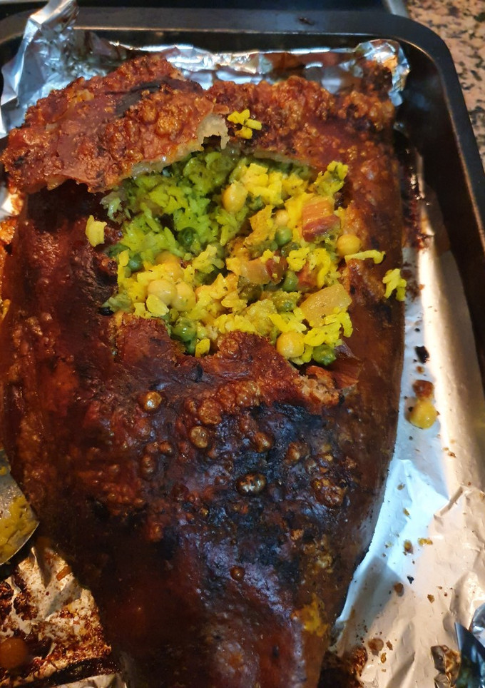 Una foto de Cojin de lechona colombiana