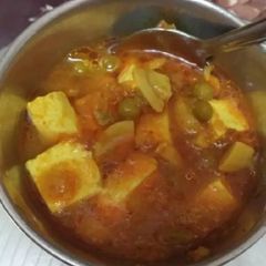 A picture of Matar Mushroom and paneer.
