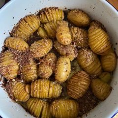 A picture of Hasselback truffle roasted potatoes.