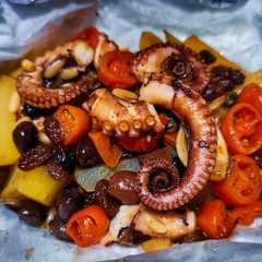 Foto di Polpo alla mediterranea al cartoccio