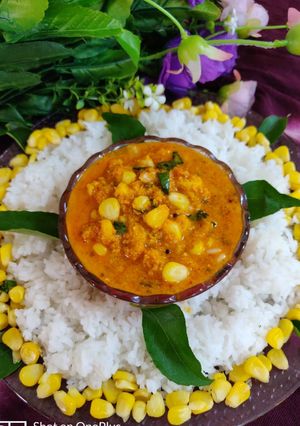 A picture of Corn curry with rice.
