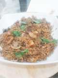 Arroz negro con pulpo y champiñones