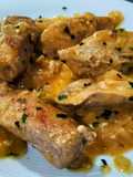 Pollo y secreto ibérico en salsa de sidra