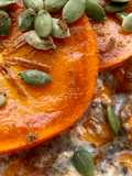 Avena con pérsimo y pepitas de calabaza