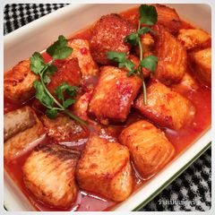 A picture of Fried Salmon with sweet chili sauce.