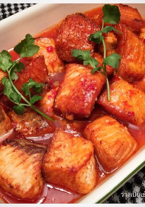 A picture of Fried Salmon with sweet chili sauce.