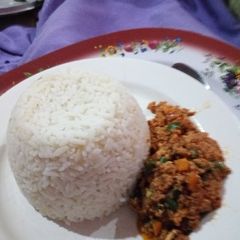 A picture of White Rice with Vegetable Egg Sauce.