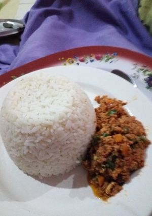 A picture of White Rice with Vegetable Egg Sauce.