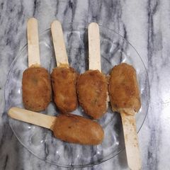 A picture of Chicken Popsicles.