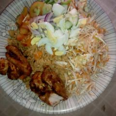 Jallof Rice with coslow n pepper chicken A picture of Jallof Rice with coslow n pepper chicken.